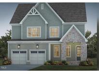 Two-story house with gray siding, brick accents, and a two-car garage at 121 Big Bradley Way, Wendell, NC 27591