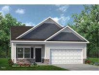 Charming one-story home with gray siding, stone accents, and a two-car garage at 19 E American Marigold Dr # 34, Benson, NC 27504