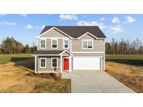 Charming two-story home features a gray exterior, red front door, and attached two-car garage at 3689 Nc 62, Burlington, NC 27217