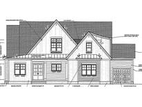 Two-story house with a gable roof, brick veneer, and two-car garage at 4908 Hidden Pasture Way, Zebulon, NC 27597