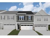 Two-story townhome with gray siding, white garage doors, and landscaping at 7129 Hubner Pl # 26, Cary, NC 27519