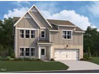 Two-story house with gray siding, white trim, and a two-car garage at 5173 Church Rd # 20, New Hill, NC 27562