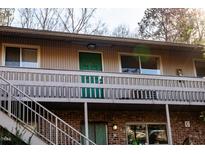 Exterior view of a condo building with parking at 6 Shepherd Ln # Blgd C, Chapel Hill, NC 27514