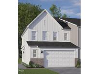 Two-story home with white siding, a brick base, and a two-car garage at 8945 Kennebec Crossing Drive # 54, Angier, NC 27501