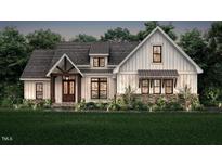 Craftsman style home with a welcoming front porch and stone accents at 2801 Mount View Church Rd, Moncure, NC 27559