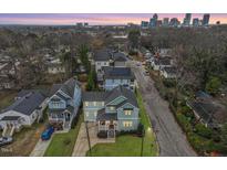 Charming neighborhood featuring Craftsman-style homes near downtown, with mature trees and inviting streetscapes at 700 Coleman St, Raleigh, NC 27610