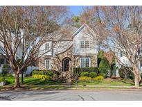 Two-story home with stone accents and landscaping at 531 Guilford Cir, Raleigh, NC 27608