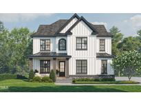 Two-story farmhouse style home with white siding, gray accents, and landscaping at 802 Tyrrell Rd, Raleigh, NC 27609