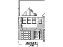 Two-story townhome elevation with garage and front door at 617 Leland Hl Cir, Zebulon, NC 27597