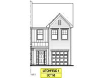 Two-story home with attached garage and multiple windows at 621 Leland Hl Cir, Zebulon, NC 27597