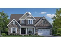 Beautiful new construction home with stone and siding and a two-car garage at 250 Ivy Ridge Rd, Chapel Hill, NC 27516