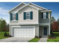 Charming two-story home featuring a welcoming facade, attached two-car garage, and professionally landscaped front yard at 2701 Princess Tree Dr, Raleigh, NC 27616