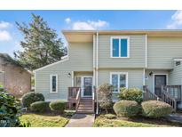 Charming townhome with a well-maintained lawn and inviting entrance, perfect for comfortable living at 250 S Estes Dr # 10, Chapel Hill, NC 27514