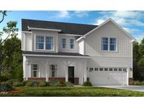 Charming two-story home with white siding, covered porch, and well-manicured lawn at 619 Contento Ct, Sanford, NC 27330