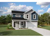 Charming two-story home boasts a classic color scheme, complemented by a well-manicured lawn and inviting front porch at 63 Lynn Crest Way, Four Oaks, NC 27524