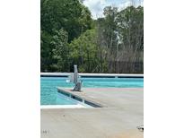 Community swimming pool featuring an accessible ramp for residents to use at 136 Kobus Ct, Garner, NC 27529
