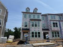 New construction townhome showing the exterior during the building phase at 315 Chesapeake Commons St # 102, Garner, NC 27529