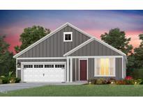 Charming single-Gathering home features a manicured lawn, attached garage, and a welcoming entrance at 344 Arcadius Dr, Clayton, NC 27520