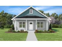 Charming home with a cozy front porch, classic design, and a well-maintained lawn at 132 Ambergate Ct, Rocky Mount, NC 27804