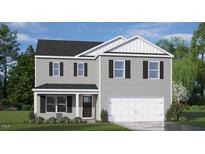 Charming two-story home with gray siding, black shutters, covered entry, and two-car garage at 86 Saddle Mare St, Clayton, NC 27520
