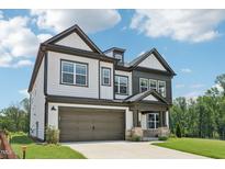 Beautiful two-story home featuring a two-car garage and landscaped front yard at 1404 Malcus Ct # 56, Fuquay Varina, NC 27526
