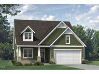 Charming craftsman-style home showcasing a two-car garage and landscaped front yard at 5849 Genesee Dr., Homesite 3, Durham, NC 27712