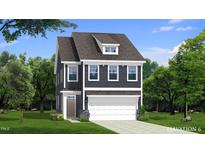 Two-story home with a dark gray facade, complemented by white trim and a covered front entrance at 79 Willow Cameron Way, Angier, NC 27501