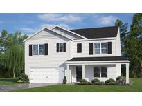 Charming two-story home featuring black shutters, a covered front porch, and a two-car garage at 904 Canis Minor Rd, Wendell, NC 27591