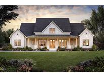 Stunning home exterior featuring a large front yard, covered porch, and a charming combination of stone and siding at 2600 Banks Rd # 1, Raleigh, NC 27603