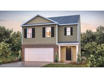 Charming two-story home with a brick-accented garage and a cozy front porch at 250 Palm Dr, Sanford, NC 27332