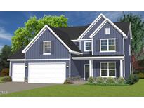 Charming two-story home featuring a two-car garage and inviting front porch at 0 Old Middlesex Rd Rd, Middlesex, NC 27557