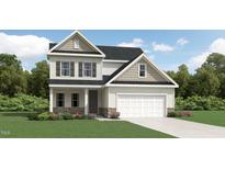 Charming two-story home featuring stone accents, vertical siding, and an attached two-car garage at 1800 Red Roses Ave, Durham, NC 27703