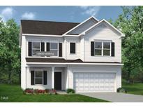 Charming two-story home with black shutters and lush green lawn at 230 Deodora Ln, Cameron, NC 28326