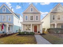 Charming two-story home with a welcoming front porch and well-manicured lawn at 4511 All Points View Way, Raleigh, NC 27614