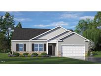 Charming single Gathering home featuring stone accents, gray siding, and a two car garage at 921 Canis Minor Rd, Wendell, NC 27591