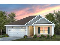 Charming single-story home showcasing classic architectural details and a well-manicured lawn at 345 Broomside Ave, Raleigh, NC 27603