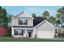Charming two-story home featuring a black roof, white garage door, and well-manicured lawn at 6453 Alfalfa Ln, Wake Forest, NC 27587