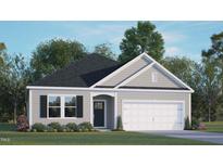 Charming single-story home with gray siding, a two-car garage, and professionally landscaped front yard at 160 Scenic Rock Dr, Youngsville, NC 27596