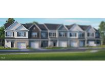 Charming new construction townhomes featuring inviting two-story floorplans and attached garages at 2207 Carcillar Dr, Apex, NC 27539