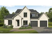 Charming two-story home featuring a brick facade, a two-car garage, and manicured landscaping at 3701 Joyful Creek Trl, Zebulon, NC 27597