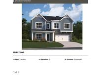 Charming two-story home featuring blue siding, stone accents, and a well-manicured lawn at 127 Moonflower Ln # Homesite 257, Clayton, NC 27520