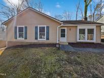 Charming single-story home with a well-maintained lawn and inviting curb appeal at 7271 Shellburne Dr, Raleigh, NC 27612