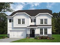 Charming two-story home featuring white siding, black shutters, and a well-manicured front lawn at 1905 Old Bramble Ln # 4, Fuquay Varina, NC 27526