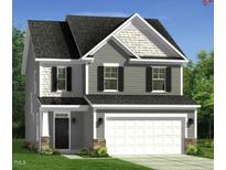 Charming two-story home featuring gray siding, a two-car garage, and a welcoming front porch at 37 Steel Springs Ln # 3, Angier, NC 27501