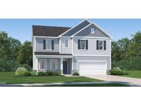 Charming two-story home with gray siding, black shutters, and a well-manicured lawn at 4108 Shadbush St, Raleigh, NC 27616