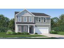 Charming two-story home featuring a classic design, inviting entrance and a two-car garage at 4120 Shadbush St, Raleigh, NC 27616