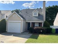 Charming single-Gathering home with a one-car garage and manicured front lawn at 5528 Roan Mountain Pl, Raleigh, NC 27613