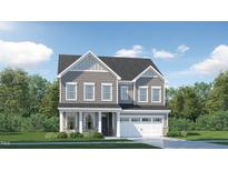 Charming two-story home with gray siding, white trim, and a well-manicured lawn at 840 Emerald Bay Cir, Raleigh, NC 27610