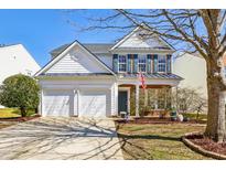 Charming two-story home with a two-car garage and landscaped front yard at 12566 Honeychurch St, Raleigh, NC 27614