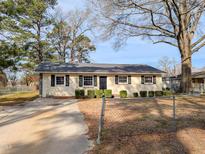 Charming single-story home with mature trees and a well-maintained front yard at 2918 Avalon Rd, Rocky Mount, NC 27801